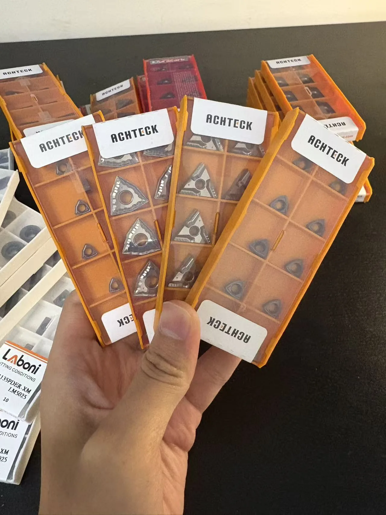 Achteck carbide insert box held in hand, part of our stocked range