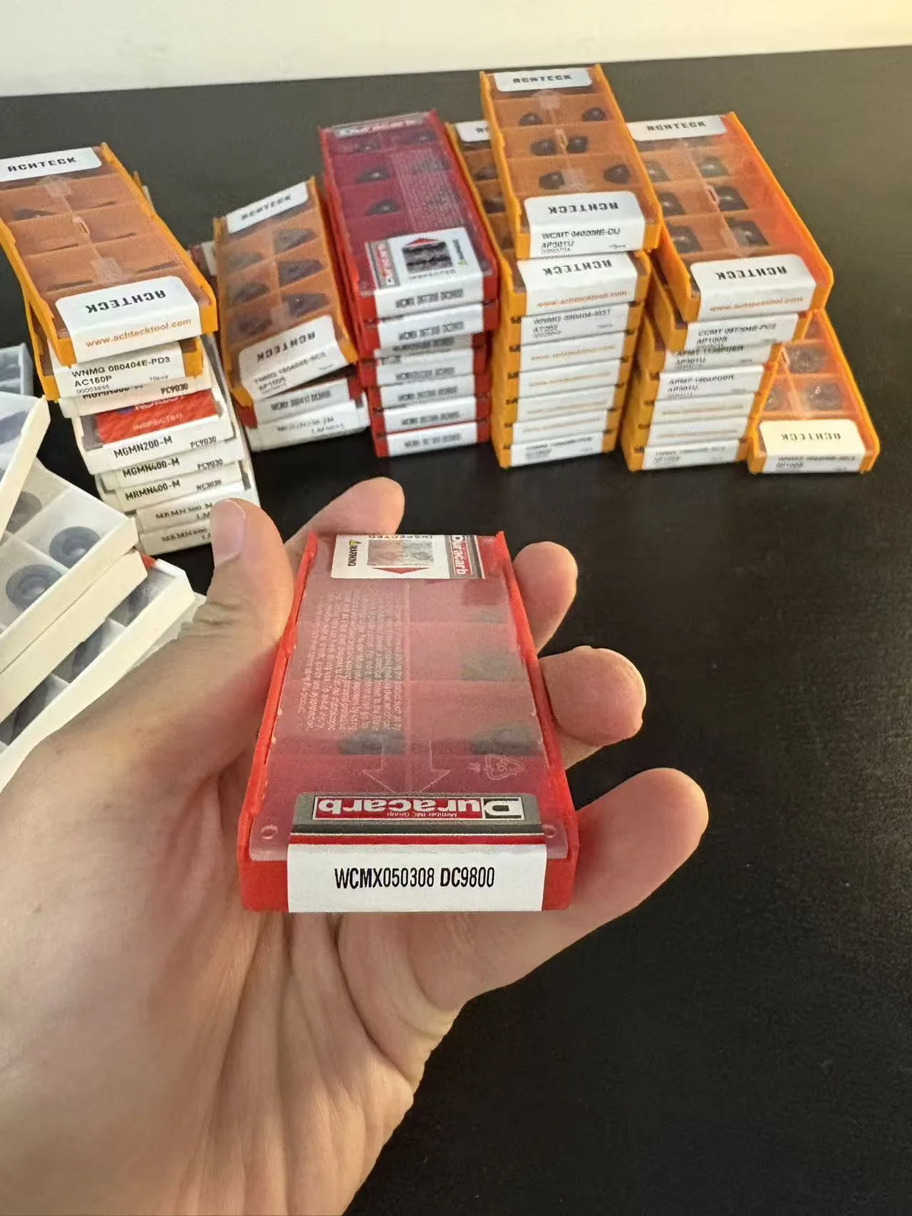 Duracarb WCMX insert box in hand, one of the brands we supply