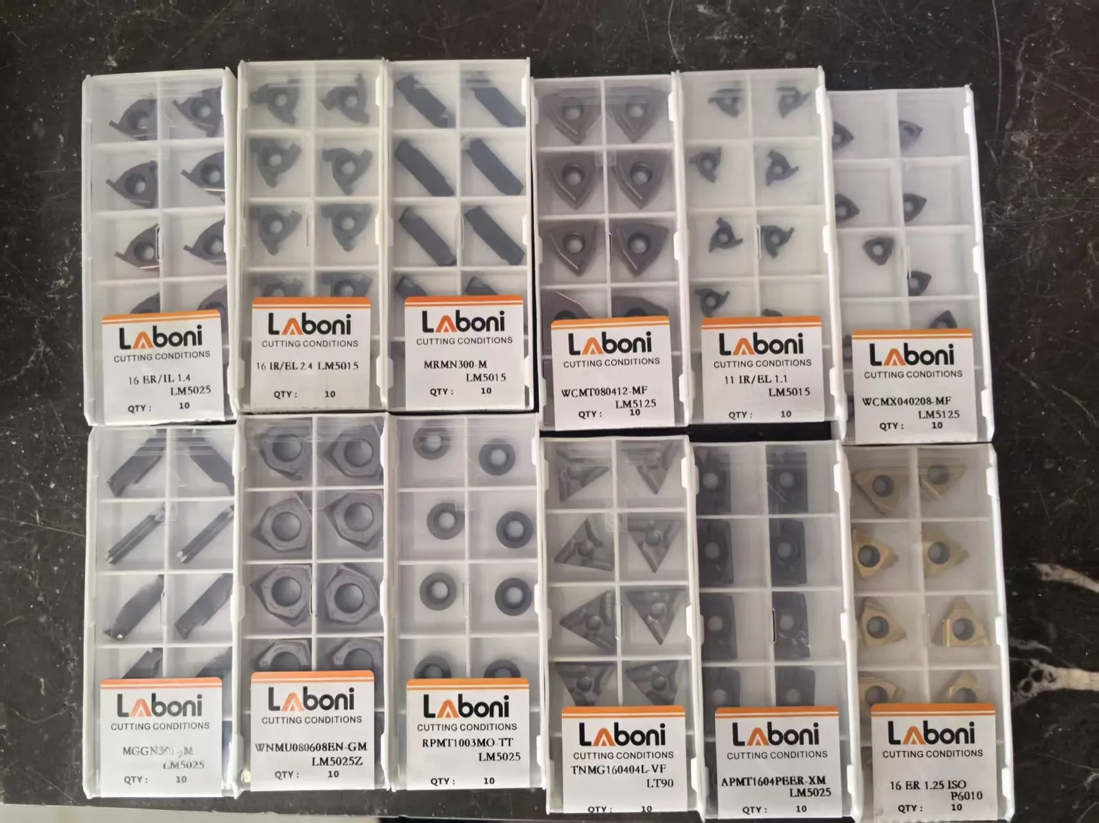 Multiple indexable insert models prepared in labeled trays